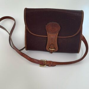Vintage Dooney and Bourke all weather leather purse bag, shoulder strap.